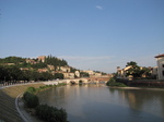 SX19098 Ponte Pietra and Castle San Pietro from river bank.jpg